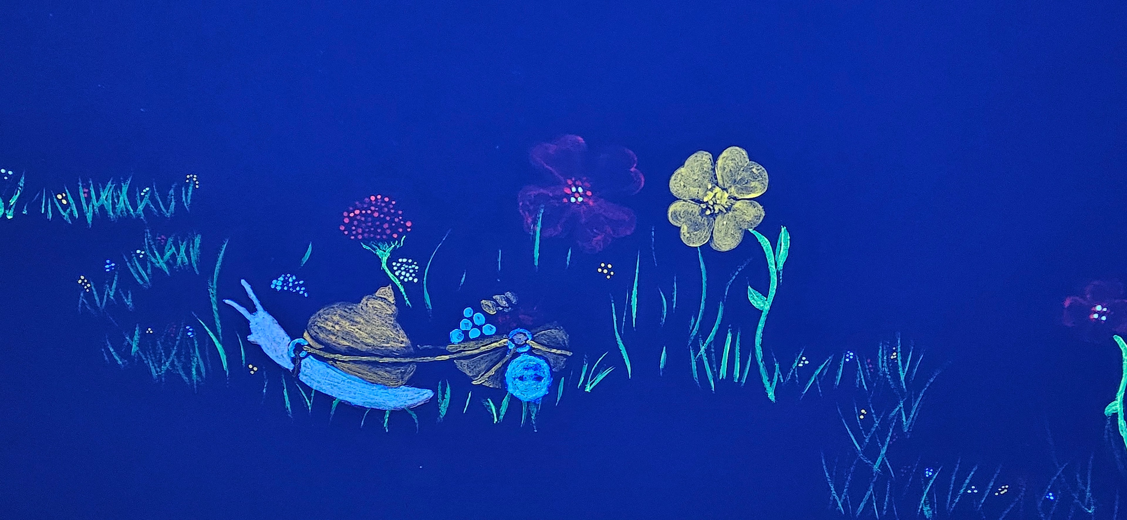 Glowing snail carrying a bindle through a meadow of glowing flowers under black light in the Fantasy Room