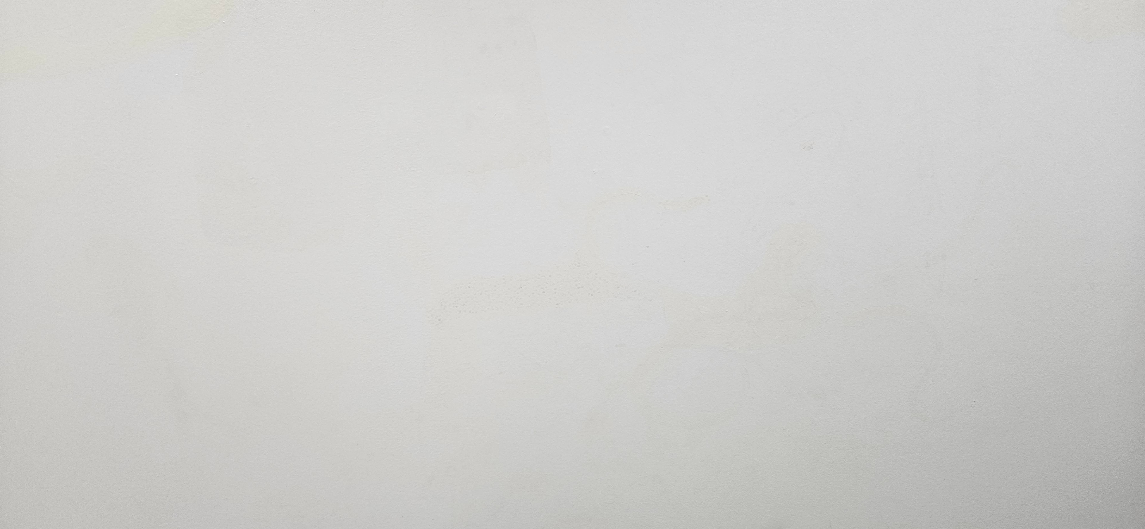 Ocean room wall in normal light before black light art transformation